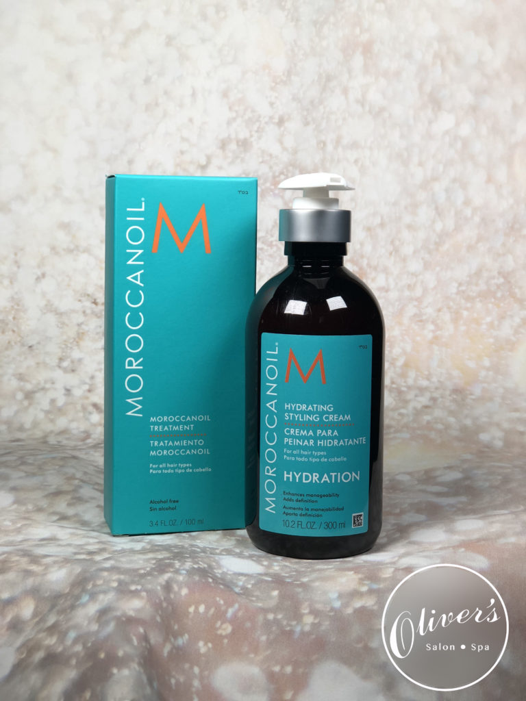 This is a photo of two Moroccan Oil products. In the bottom right corner is the Oliver's logo in white. 